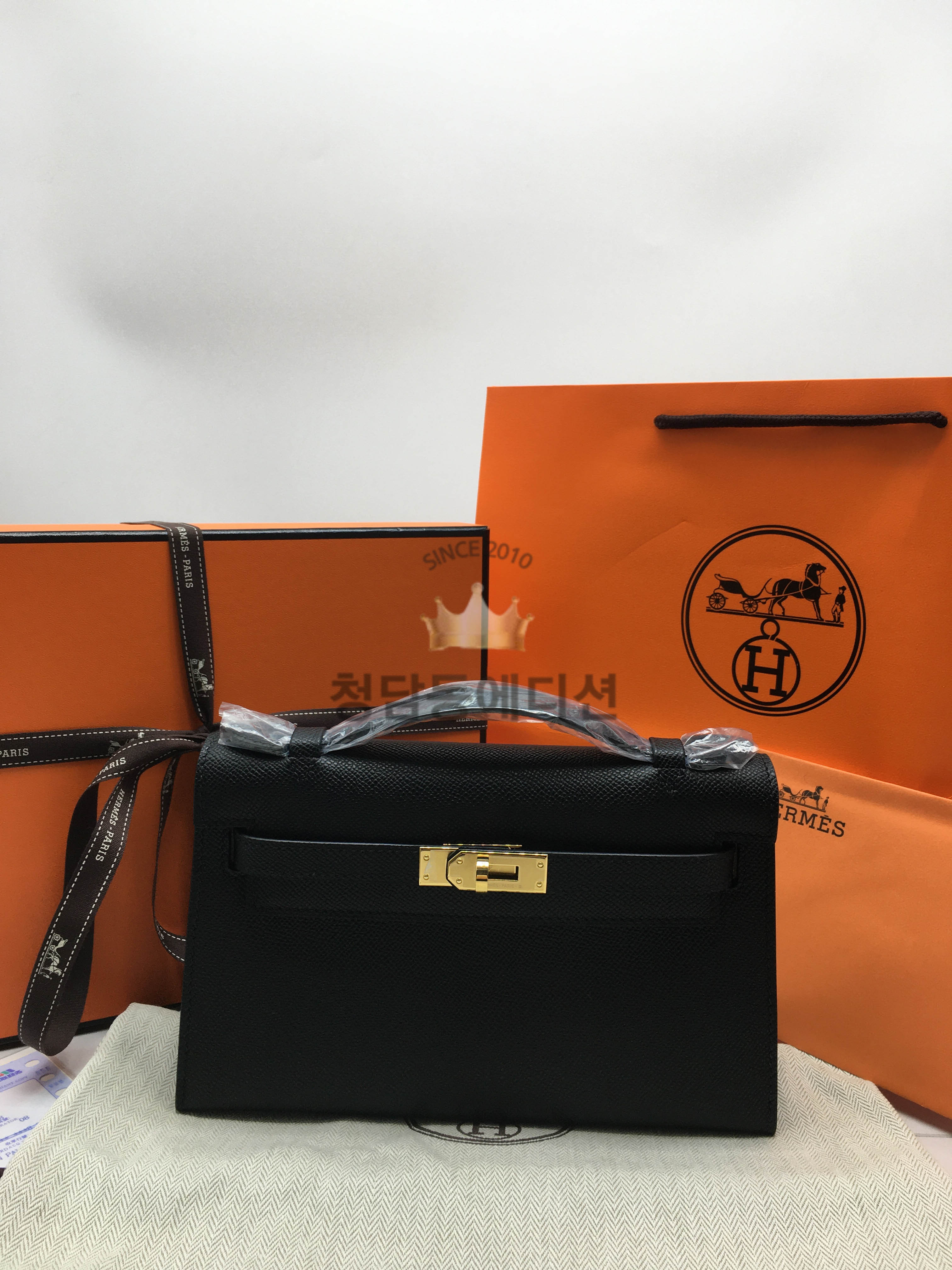 에르메스 켈리 포쉐트 22cm 반수공 (컬러 누아)