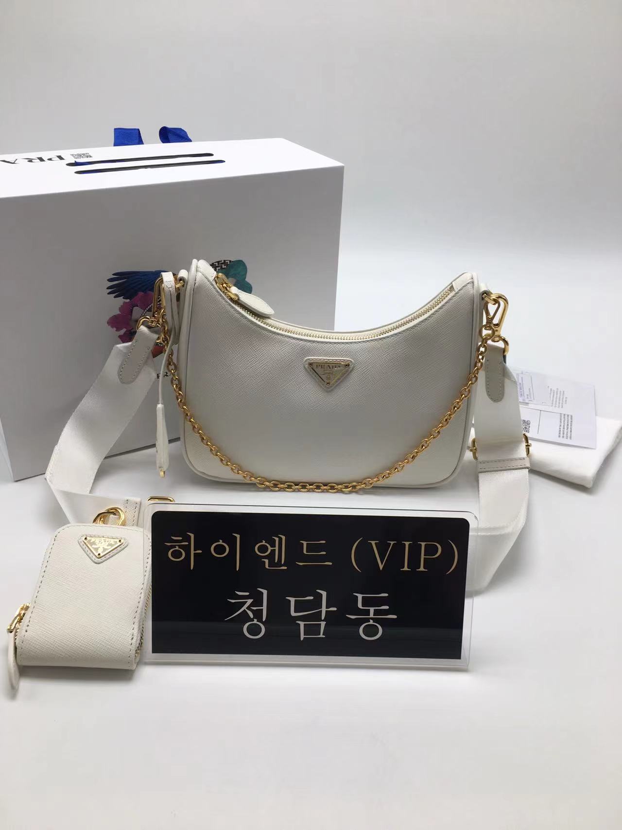 프라다 리에디션 사피아노 테수토 호보백 204BH23