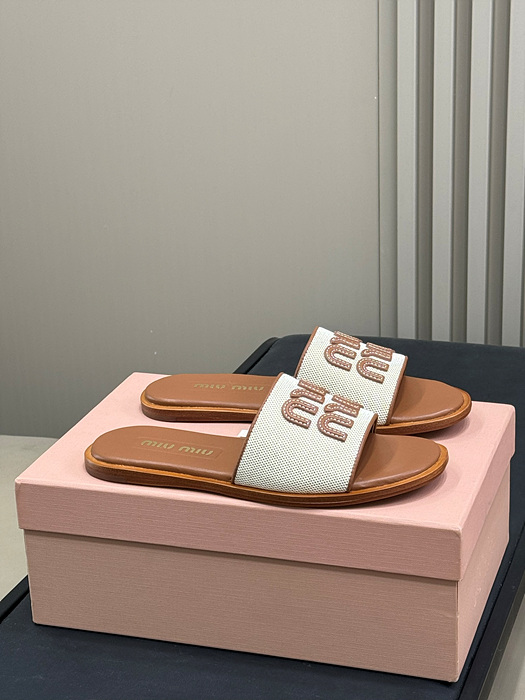 미우미우 캔버스 및 가죽 슬라이드